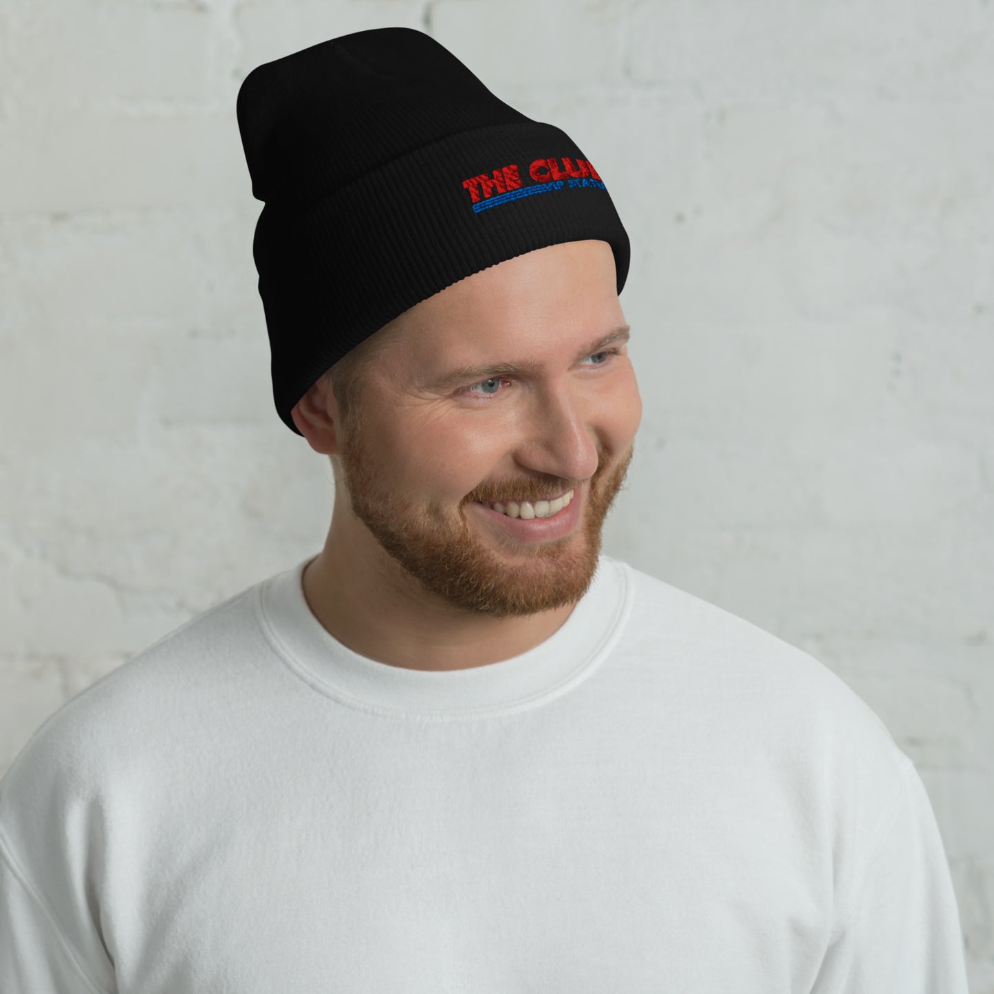 Black cuffed beanie from The Club Costco collection by Say Something Swag, featuring a printed design on the front.