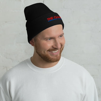 Black cuffed beanie from The Club Costco collection by Say Something Swag, featuring a printed design on the front.